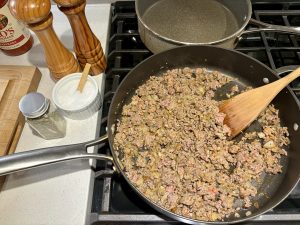 meat cooking in pan